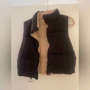 Reversible tan and black puffy crop vest